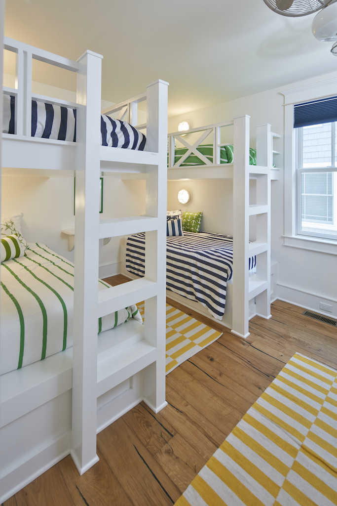 The Big Easy bunkbeds with bedspreads in bright colors