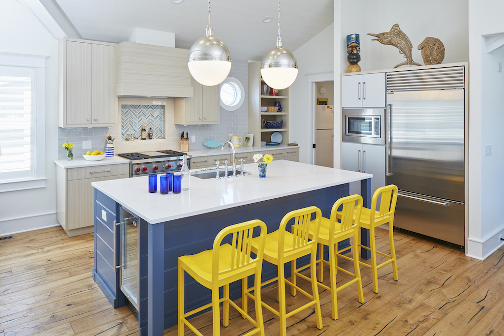 The Big Easy kitchen with yellow stools and blue island